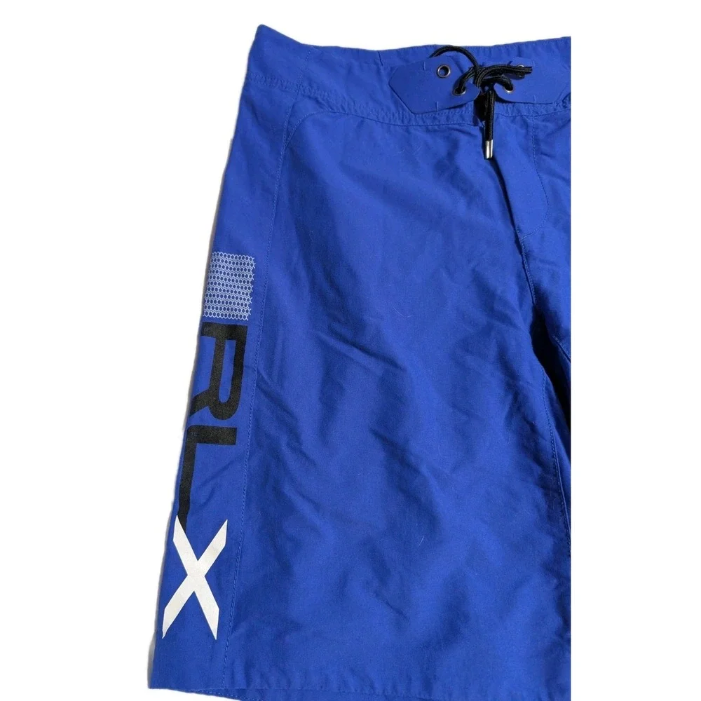 RLX Ralph Lauren Men's L Blue Performance Board Shorts Swim Trunks R2 Zip Pocket